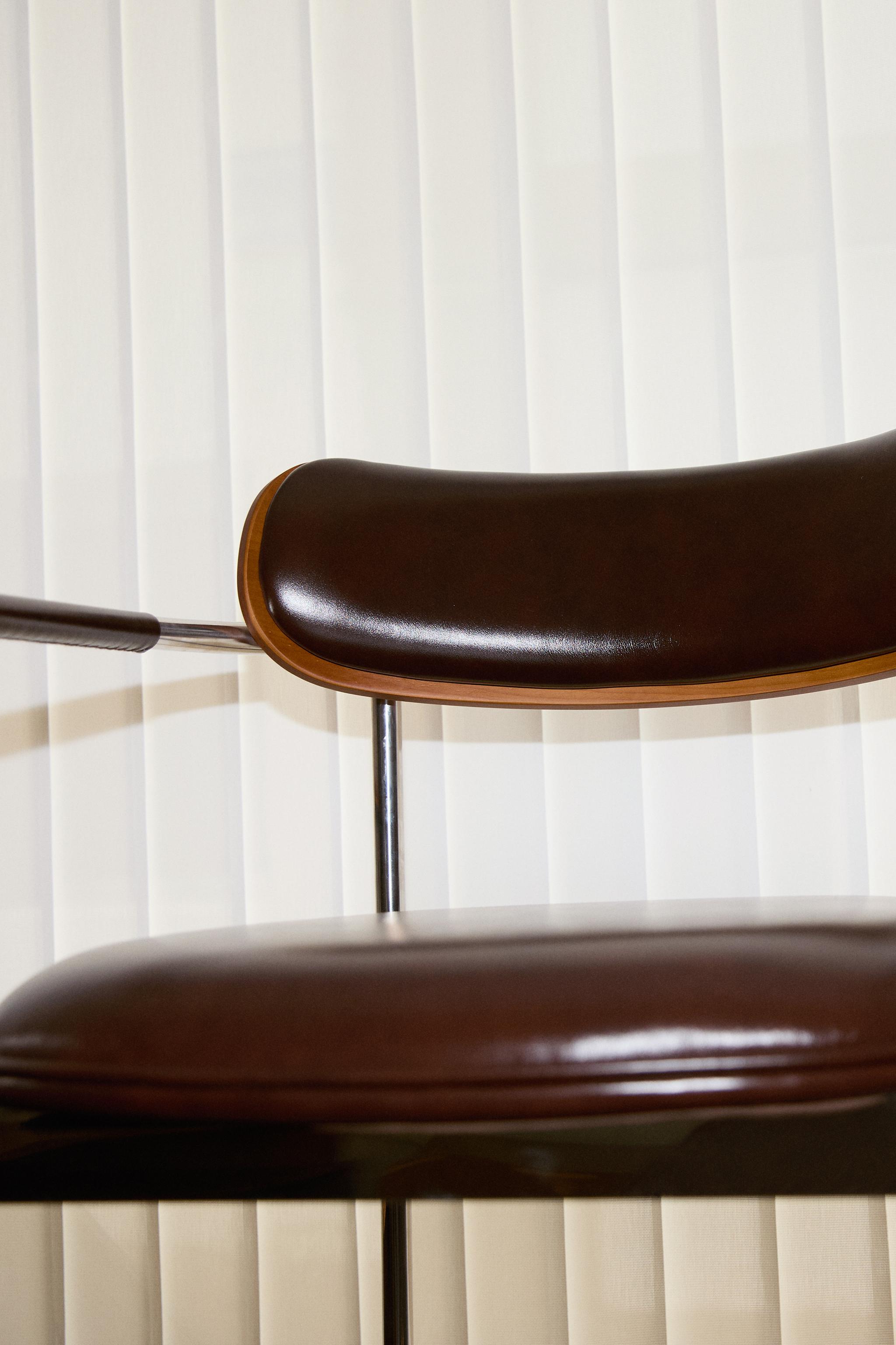 LEATHER AND STAINLESS STEEL CHAIR